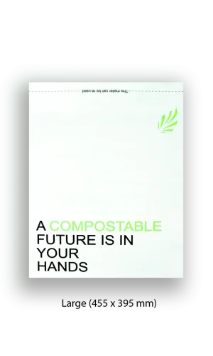 Close-up of white compostable mailers with black and green text.